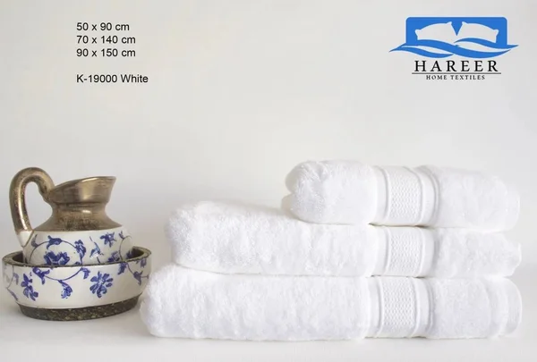 Embossed 100% cotton towel from the Silk brand, high-quality soft material, available in various sizes and colors.